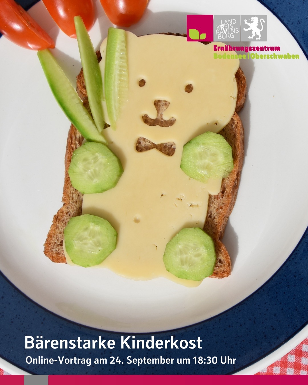 Auf einer Scheibe Brot ist eine Scheibe Käse in Bärenform und ein paar Gurkenscheiben. Bildtext: Bärenstarke Kinderkost, Online-Vortrag am 24. September um 18:30 Uhr.