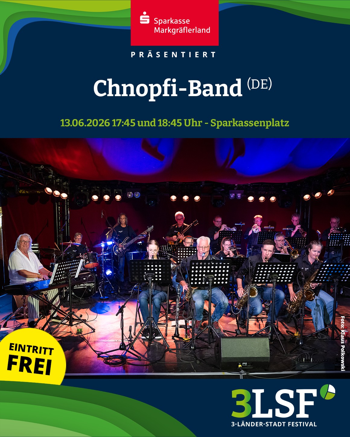 Sparkasse Markgräflerland präsentiert die Chnopfi-Band (DE) am 13.06.2026 um 17:45 und 18:45 Uhr auf dem Sparkassenplatz; Eintritt frei. Auf der Bühne spielt eine Gruppe mit Blasinstrumenten, Keyboard und Schlagzeug vor Notenständern. Unten rechts das Logo des 3-LSF 3-Länder-Stadt Festivals. (KI-Alternativtext)