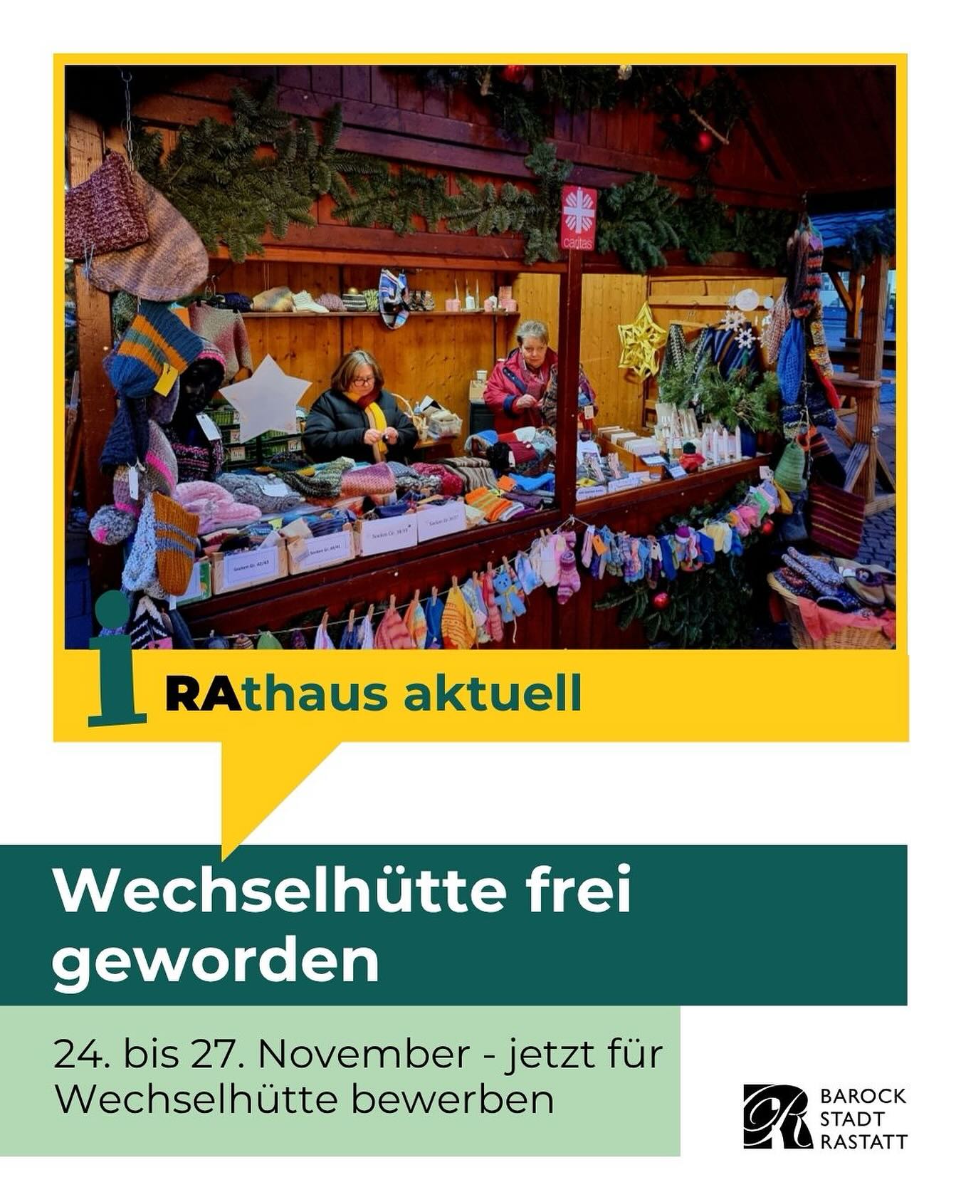 Dieser Alternativtext wurde KI-generiert: Ein Marktstand mit bunten Strickwaren und Accessoires steht vor einem Gebäude. Ein Schild kündigt einen Markt an, der vom 24. bis 27. November stattfindet.