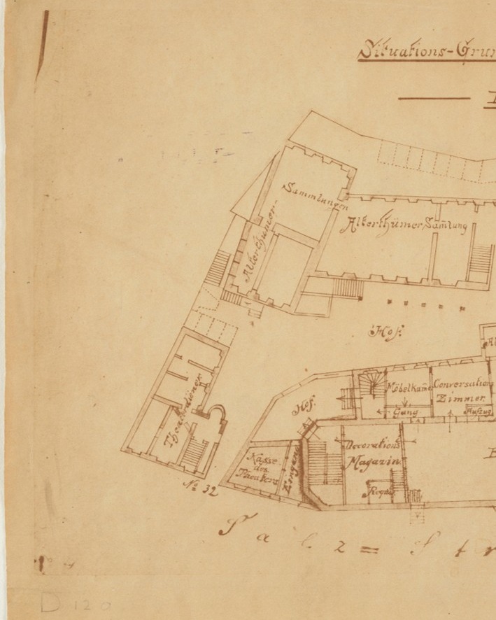 Dieser Alternativtext wurde KI-generiert: Schwarz-weißes, historisches Dokument: Es zeigt einen detaillierten Grundriss eines Gebäudekomplexes mit Beschriftungen in alter Schriftart.