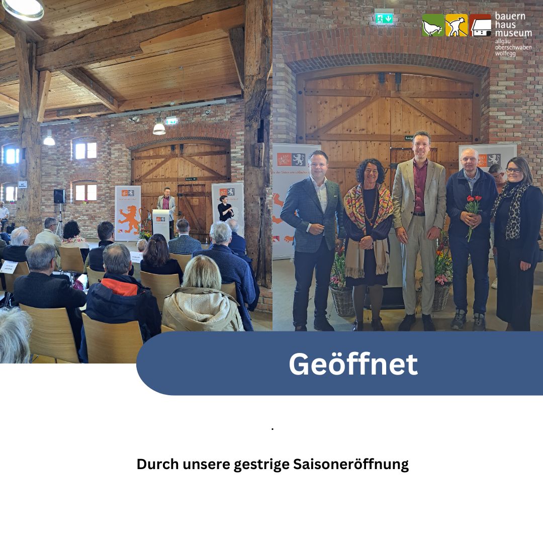 Dieser Alternativtext wurde KI-generiert: Eine Gruppe von Personen steht in einem hellen Raum mit Holzbalken. Im Vordergrund hält jemand Pflanzen, während im Hintergrund weitere Personen sitzen und zuhören.